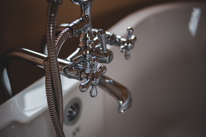 A chrome bath tap