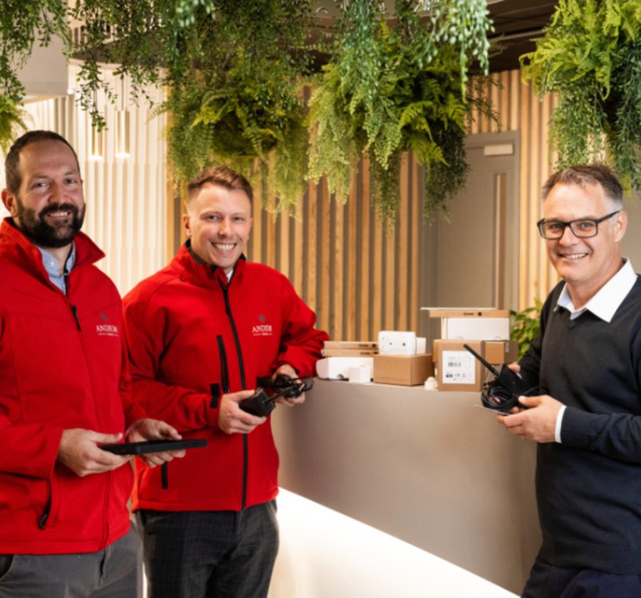 The Andium Homes team and Jonathan Anderson of IoT CI with the project's sensors
